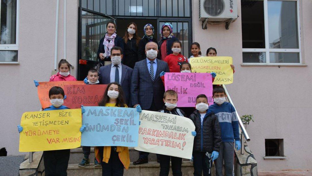 2-8 Kasım Lösemili Çocuklar Haftası münasebetiyle Sıtkı Çetin Ortaokulu öğrencileri İlçe Milli Eğitim Müdürümüz Sayın Ramazan KİLLİ'yi makamında ziyaret ettiler